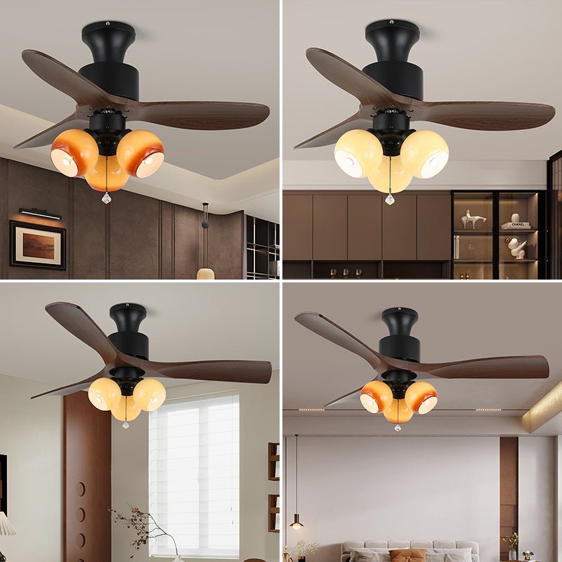 Immagine lifestyle del ventilatore da soffitto Veloria Vintage con luce in vetro e legno in una camera da letto